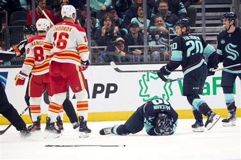 Flames’ Mangiapane suspended 1 game by NHL for cross-checking Kraken’s McCann